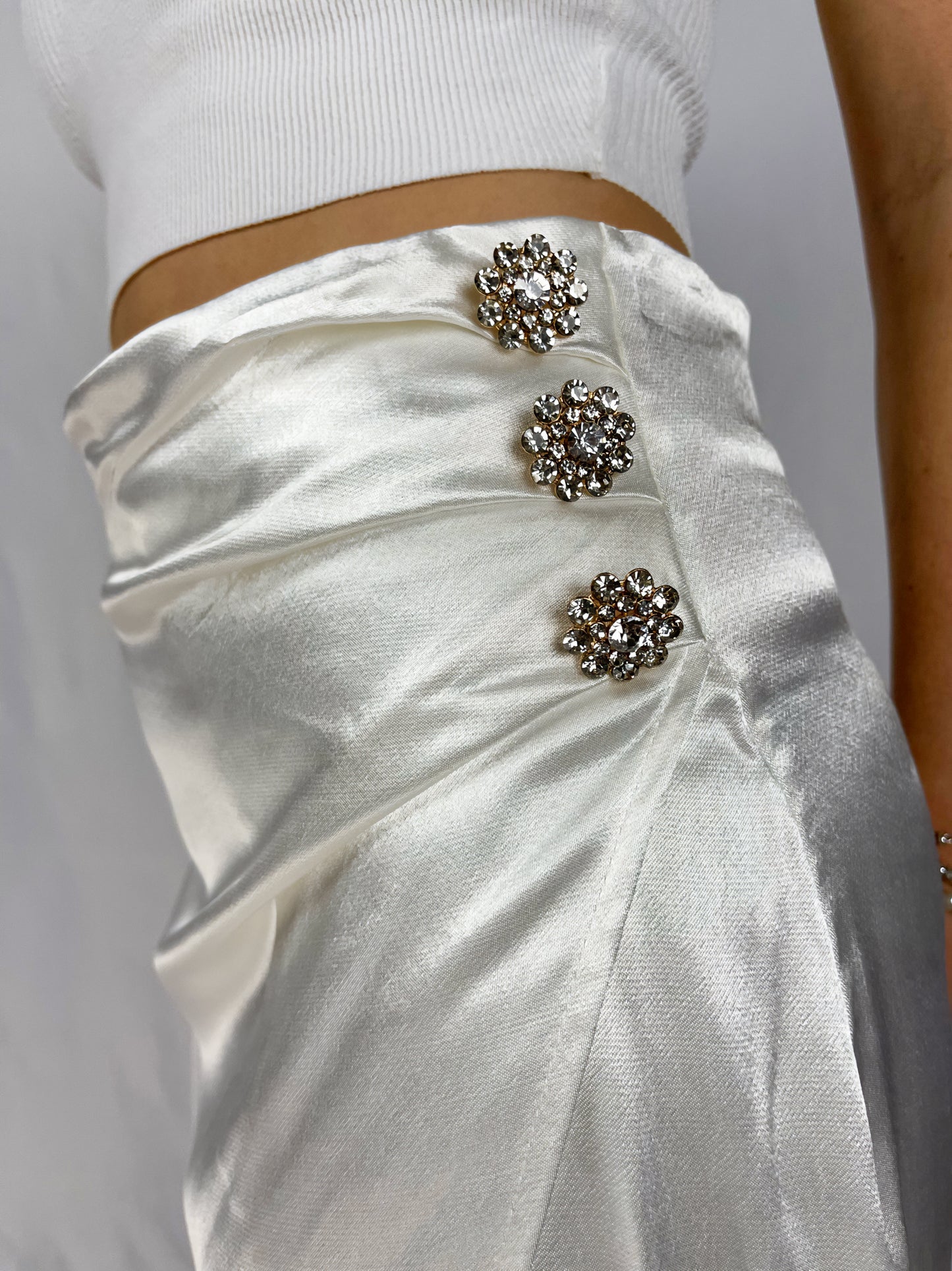 Satin skirt with jewel buttons